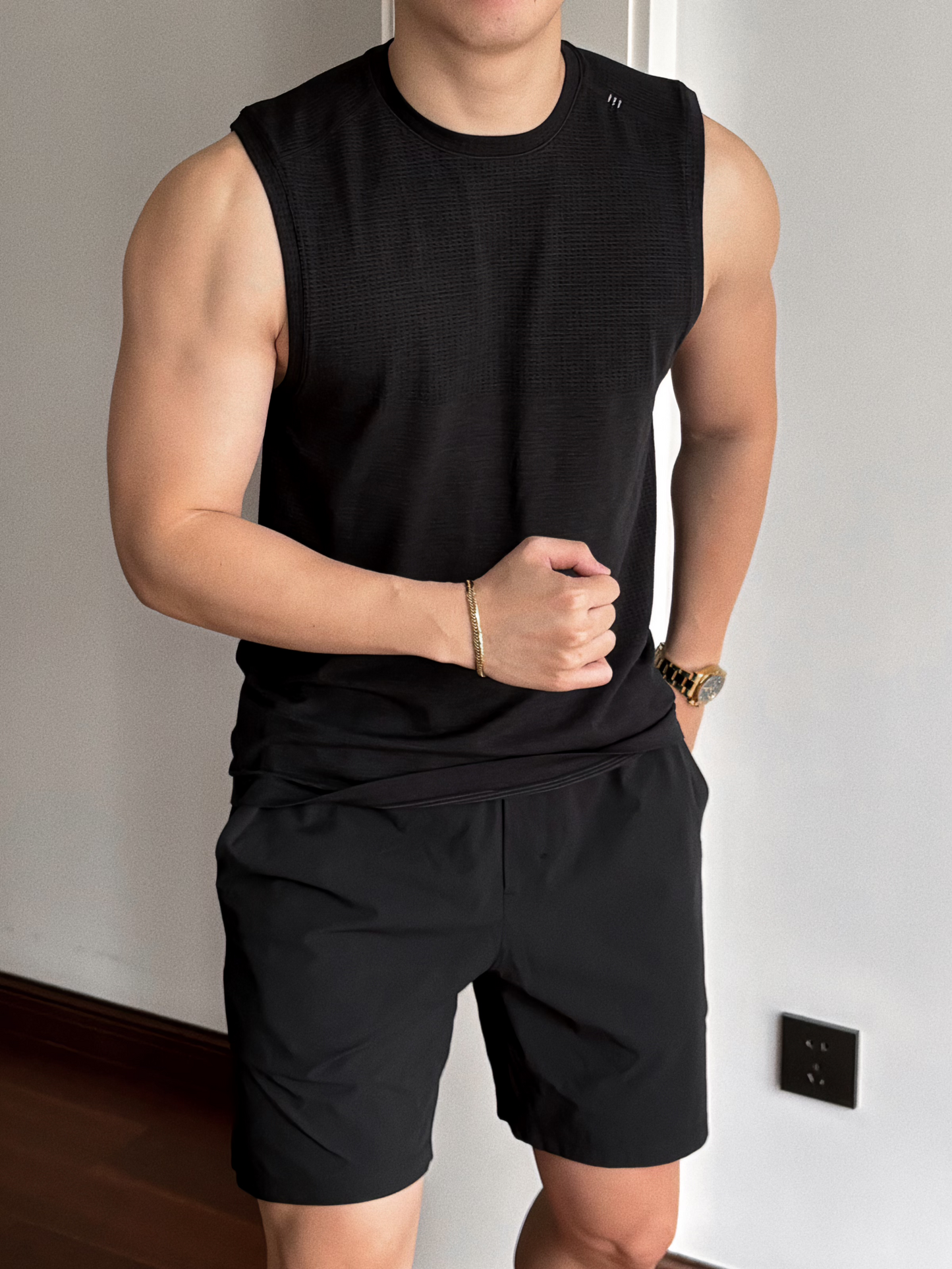 black MVT sleeveless shirt