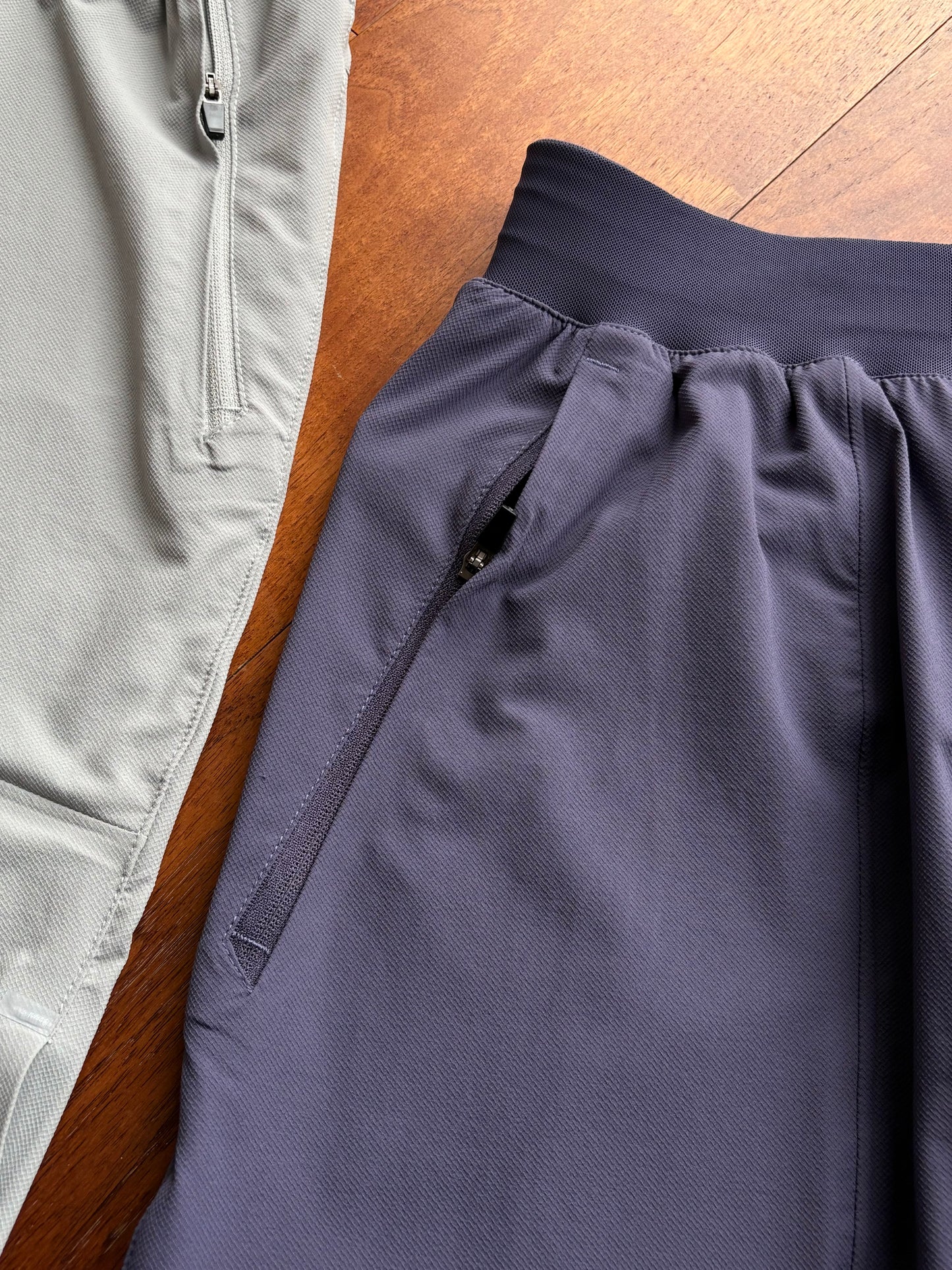 LTT shorts withs  a zipper, allowing for the secure storage of items.
