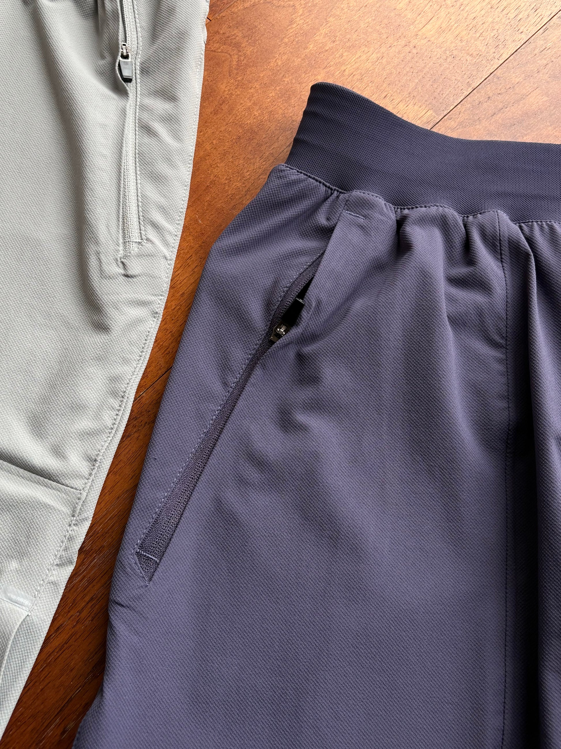 LTT shorts withs  a zipper, allowing for the secure storage of items.