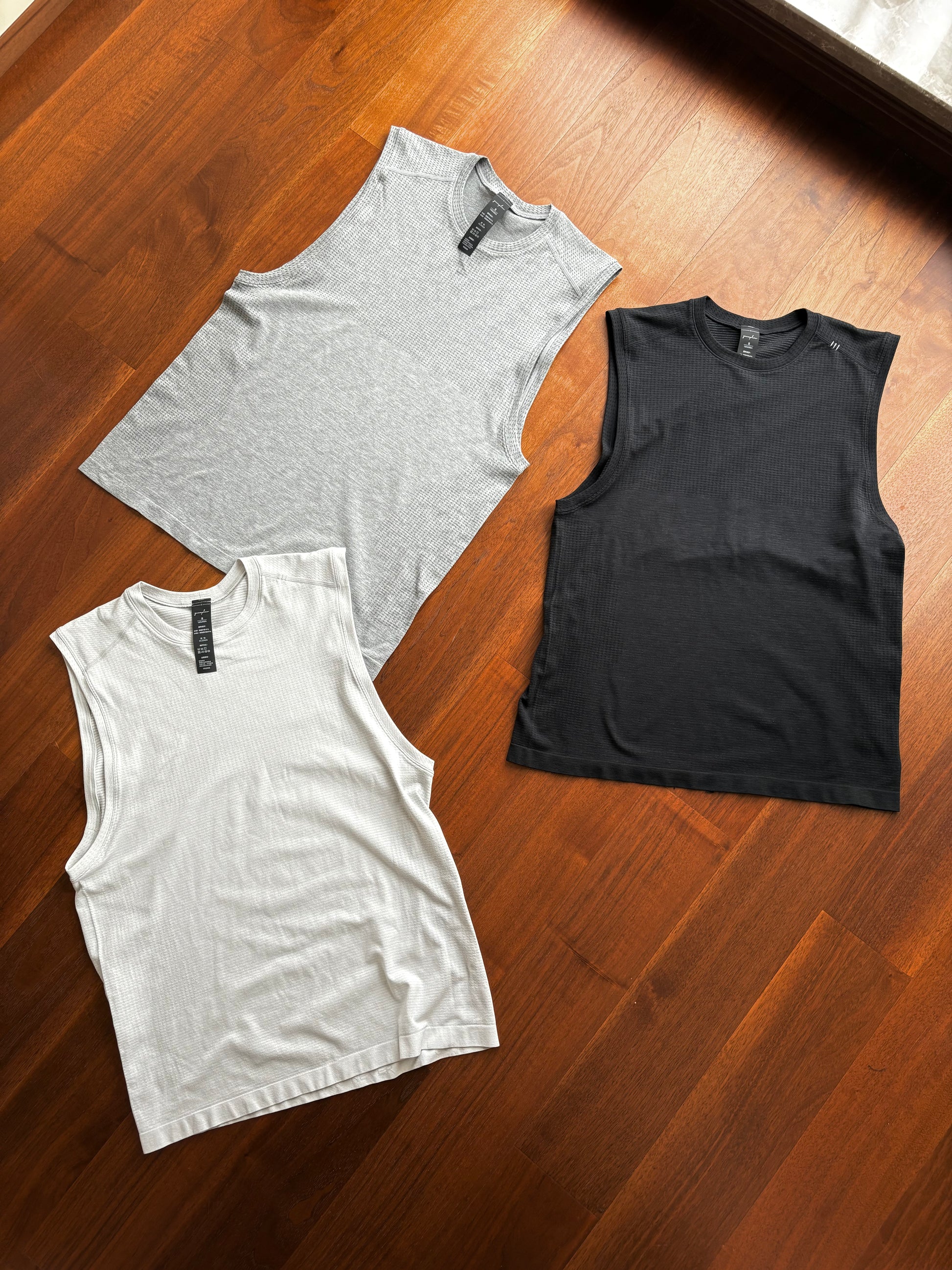 MVT sleeveless shirt  with black white and grey 