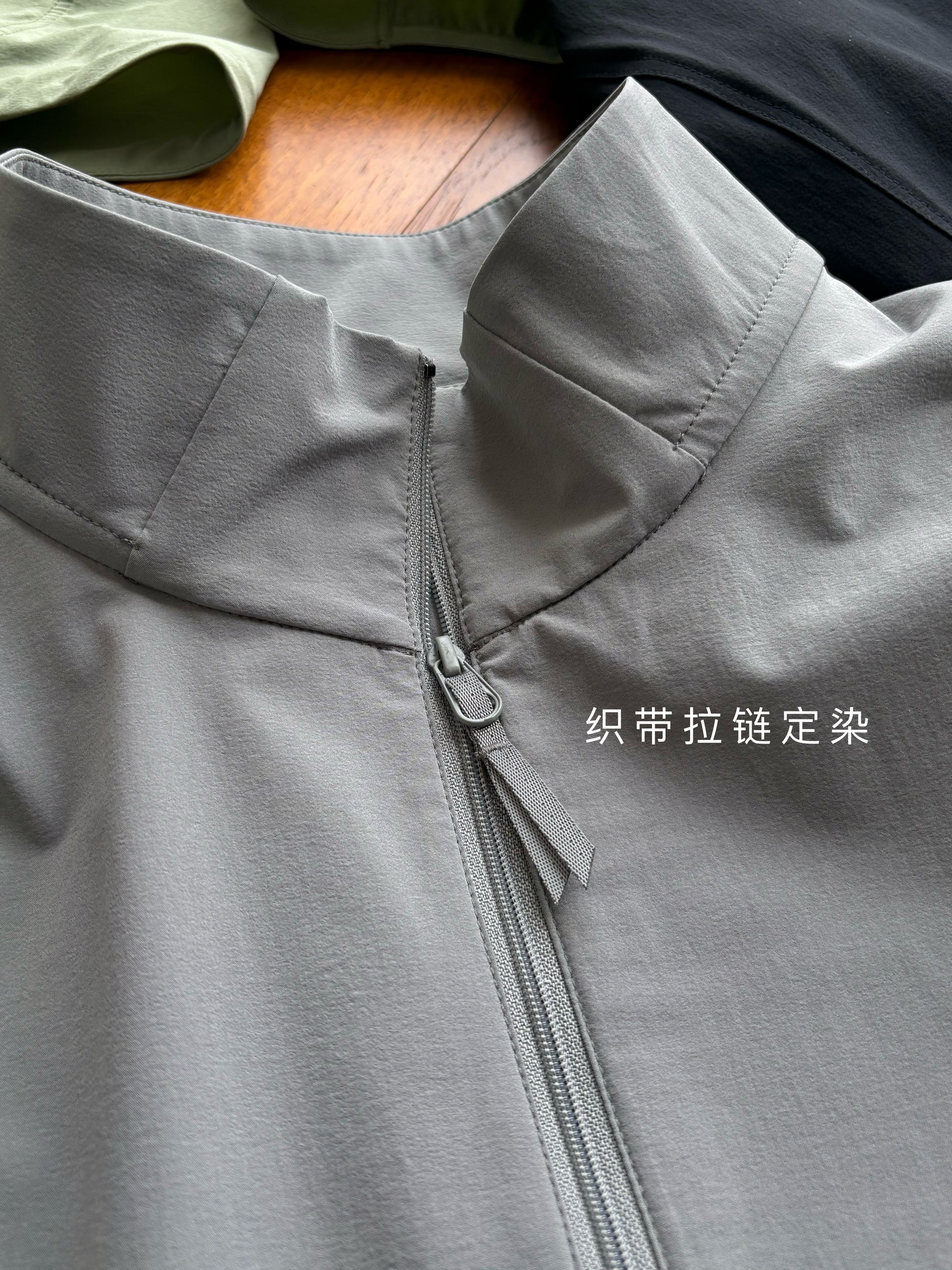 acrop jacket zippers and webbing are also custom-woven and dyed