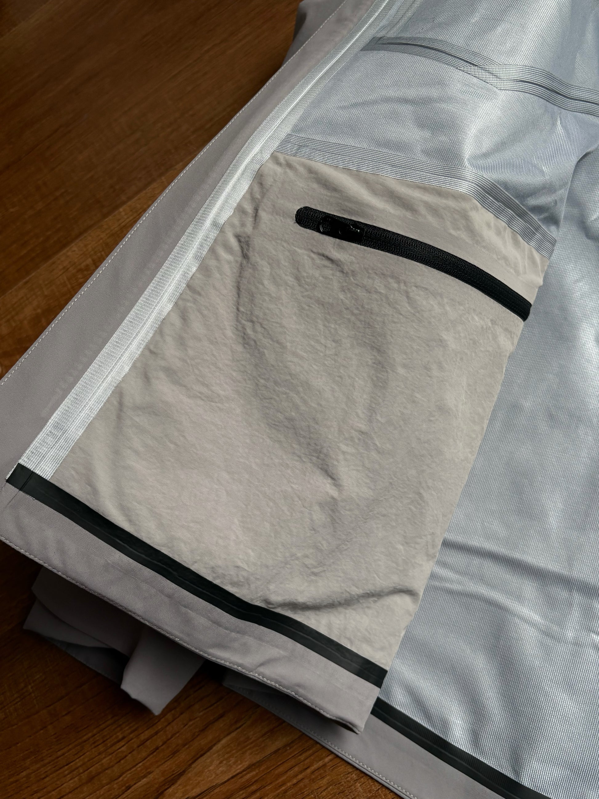 filed jacket with pocket with zippers inside